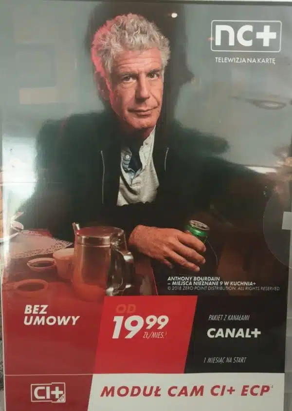 Man sitting, advertisement poster for TV subscription service.