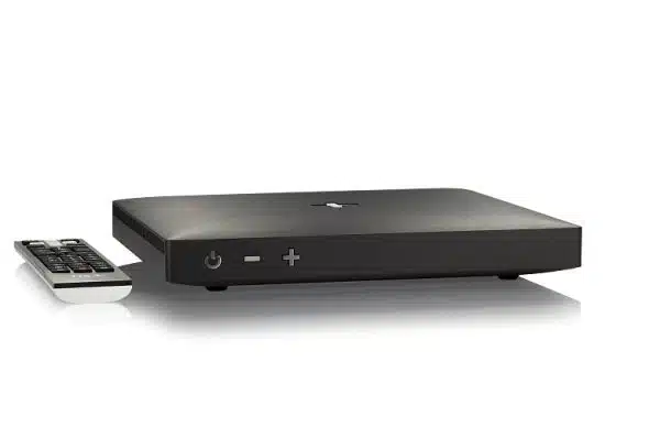 Black streaming media player with remote control.