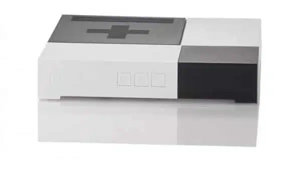 Classic video game console on white background.
