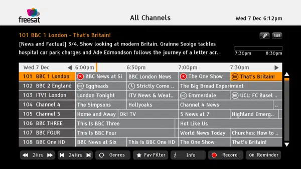 TV guide screen showing Freesat channels and program times.