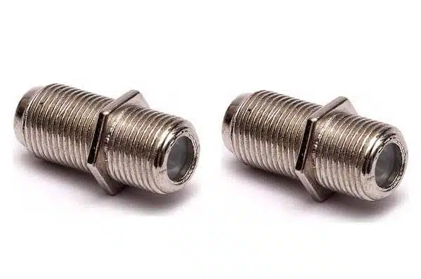 Two metal coaxial cable connectors on white background.
