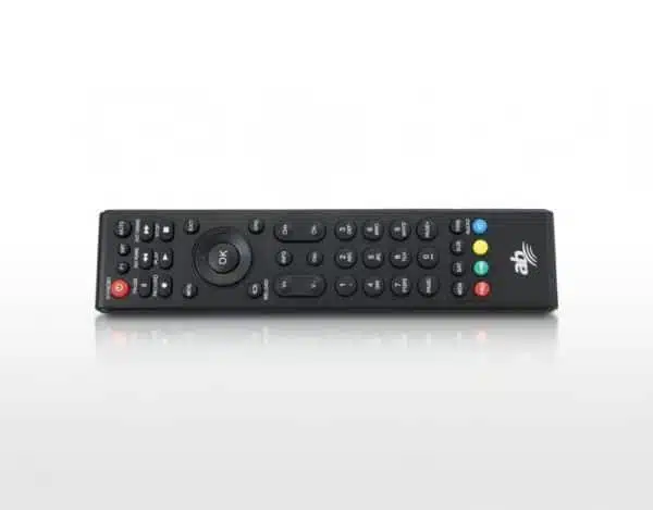 Black modern TV remote control on white background.