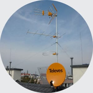 Rooftop antennas with clear sky;background.