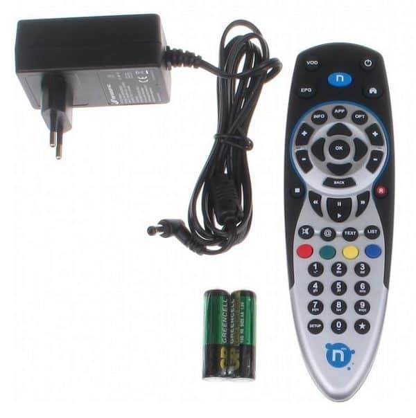 Universal remote control with power adapter and batteries.