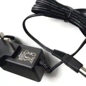 Black laptop charger with UK plug on white background.