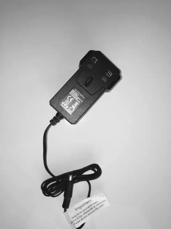 Black and white photo of an HDMI adapter with cable.
