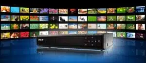 Cable box with various TV channel thumbnails displayed.