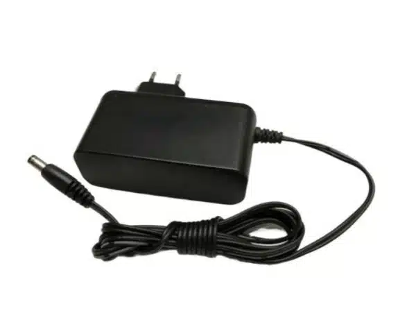 Black laptop power adapter with cord on white background.