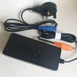 Black laptop charger with UK plug and connected cables.